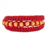 Amulet bracelet with amber balls and red thread