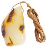 Pendant made of light amber with impurities