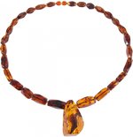 Amber beads with a large pendant stone