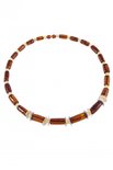 Amber beads with decorative inserts