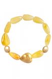 Bracelet with amber in the form of drops with decorative inserts