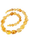 Beads made of light amber stones “Crumpled Cherry”