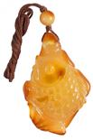 Amber pendant in the shape of a fish