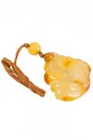 Pendant carved from amber stone “Fish”