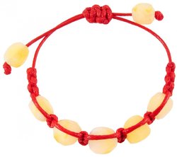 Amulet bracelet with red thread and light polished amber