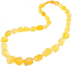 Beads made of light multifaceted polished amber stones