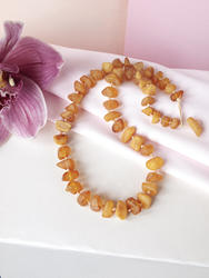 Healing beads made of polished amber stones “Rowan”