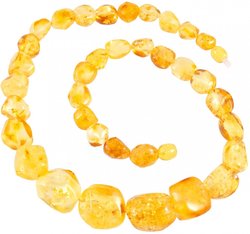 Amber beads made of light translucent polished stones