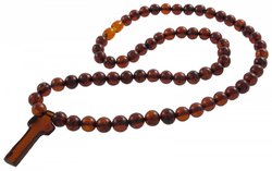 Beads made of amber balls with a cross