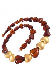Heart beads with amber and decorative elements