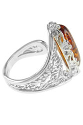 Перстень в срібній оправі з квітковими візерунками «Тара»