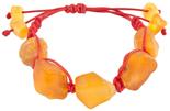 Amulet bracelet with red thread and polished honey-colored amber
