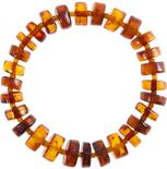 Bracelet made of cognac-colored amber donut stones