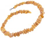 Medicinal beads with polished amber stones