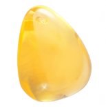 Pendant made of polished amber with a voluminous triangular shape