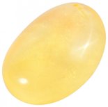 Pendant made of polished amber in a voluminous oval shape