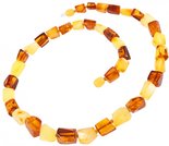 Beads with a combination of light and dark multifaceted polished amber stones