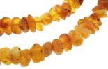 Long beads made of polished amber (medicinal)