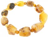 Amber bracelet with alternating figured stones and balls