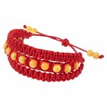 Amulet bracelet with amber balls and red thread