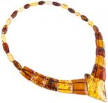 Beads with a combination of dark and light figured amber stones (with a diamond-shaped center)