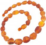 Beads made of dark polished amber “Grapes”