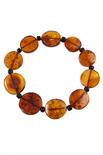 Bracelet made of amber stones in the shape of coins