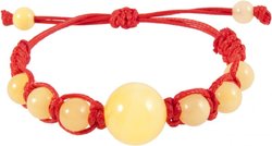 Amulet bracelet with red thread and light amber balls