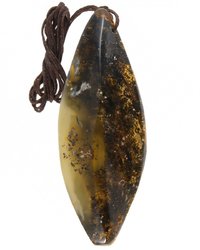 Pendant made of polished amber stone in dark shades