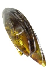 Brooch-stone made of green amber