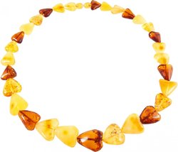 Beads made of amber stones in the shape of a heart