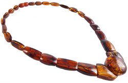 Beads with figured amber stones (with a round center)