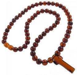 Beads made of amber balls with a cross