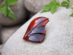 Amber brooch carved in the shape of a leaf