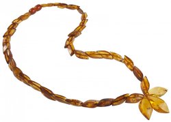 Amber beads made of figured stones