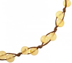 Bracelet made of amber balls on a rope