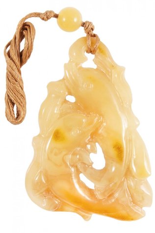 Pendant carved from amber “Dolphins”