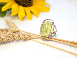 Silver ring with amber “Nika”