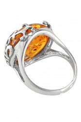 Кольцо с янтарем в серебряной ажурной оправе «Кружево»