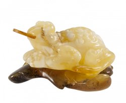 Amber figurine “Frog with a coin”